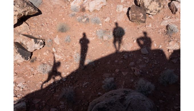 Four climber's silhouettes
