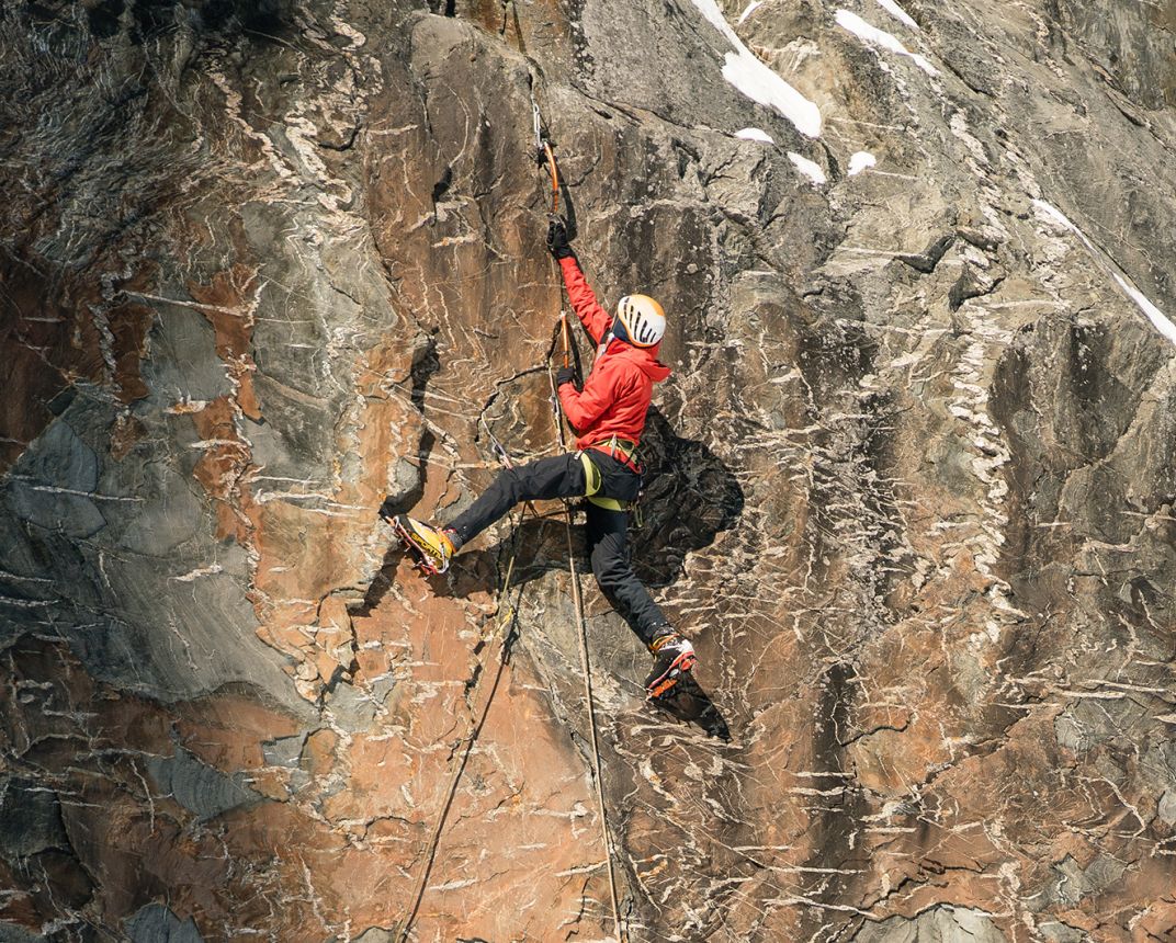 Mixed climber on rock