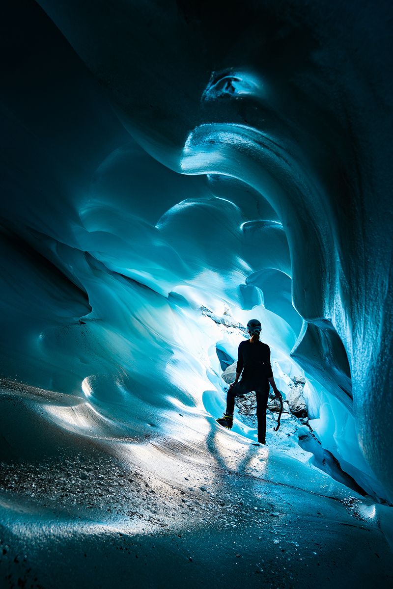Climber in glacial crevasse
