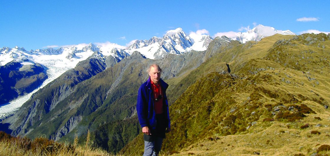 Ben Winnubst near Mt Fox. Image: Richard Pears Man in mountain tussock