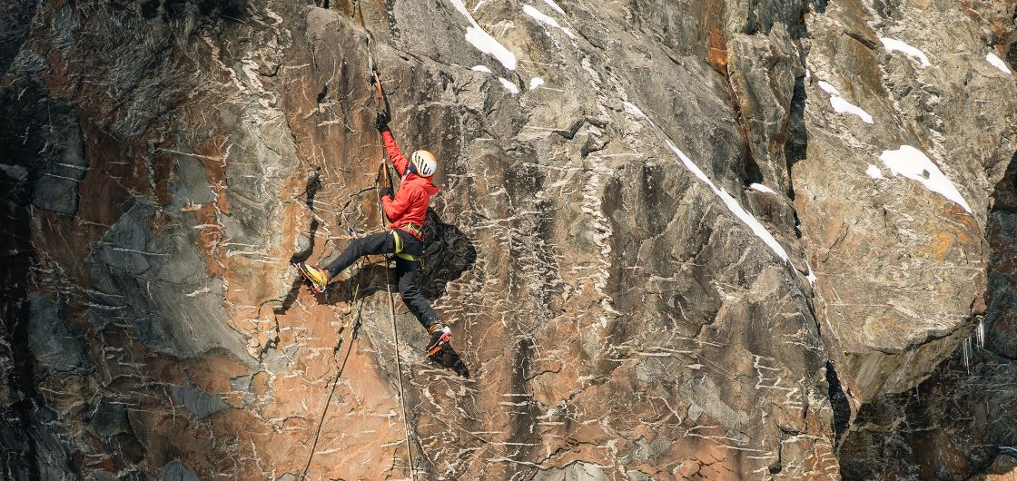 Alastair McDowell on Under Pressure (M8) in The Remarkables. Photo: Tom Hoyle Mixed climber on rock