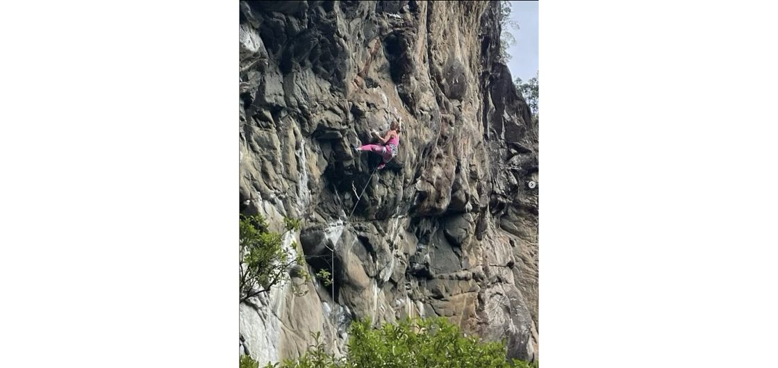 Female climber on steep route