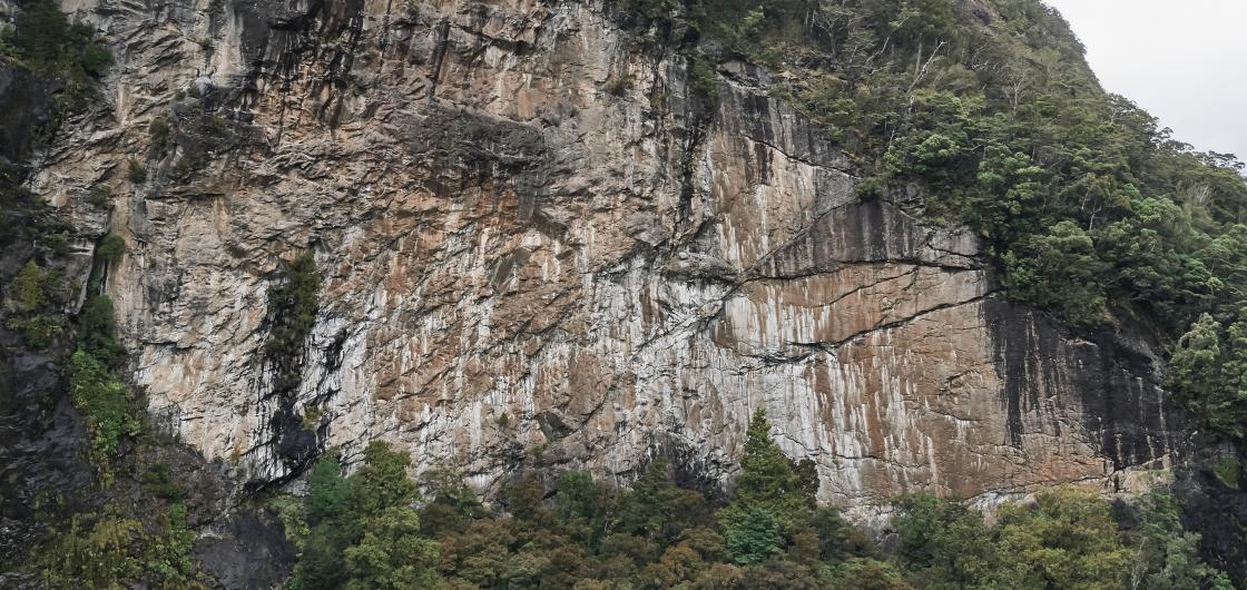 Big Babylon Crag in Fiordland Rock climbing cliff