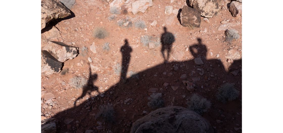 The Sub Alpine Team at the Kraft Boulders. Photo: Isaac Buckley Four climber's silhouettes