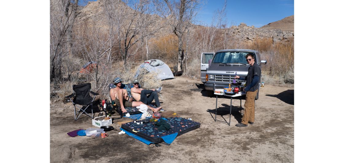 The team's campsite at Bishop Climber's campsite with van and tents.
