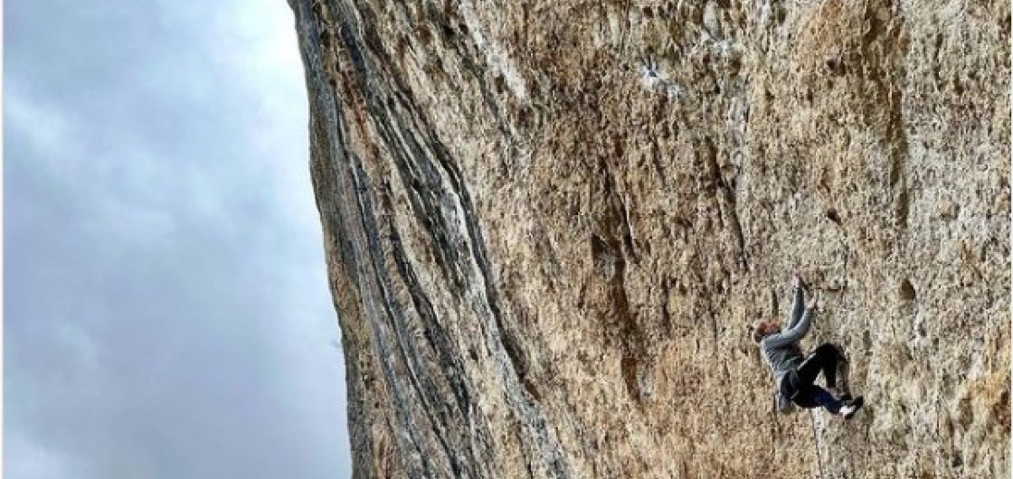 Janja Garnbret 8c onsight Fish Eye Female climber on steep rock.