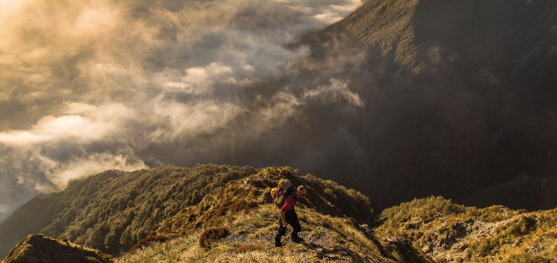 Chris Oates on Rome Ridge Climber bout clouded valley