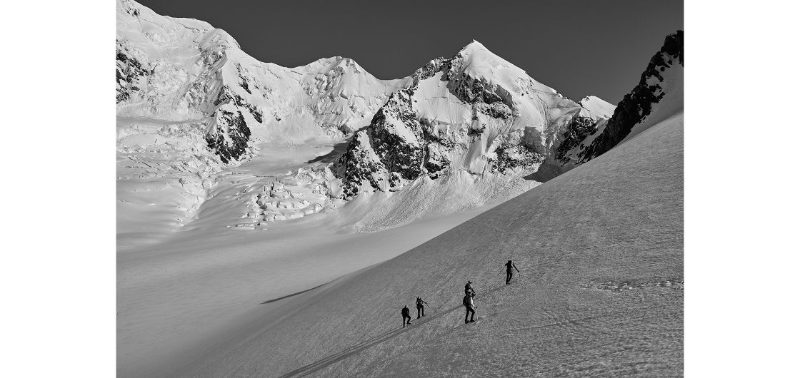 black and white image oif mountaineers near Aoraki