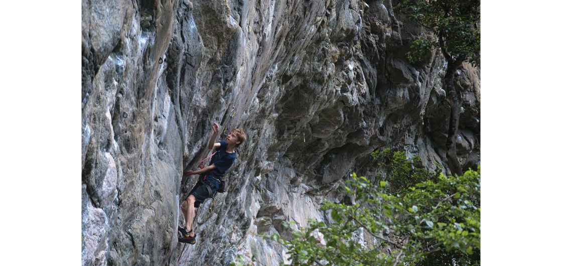 Liadan Dickie attempting No Country For Old Men (29) at Little Babylon. Photo: Paul Bulbon Climber on steep granite