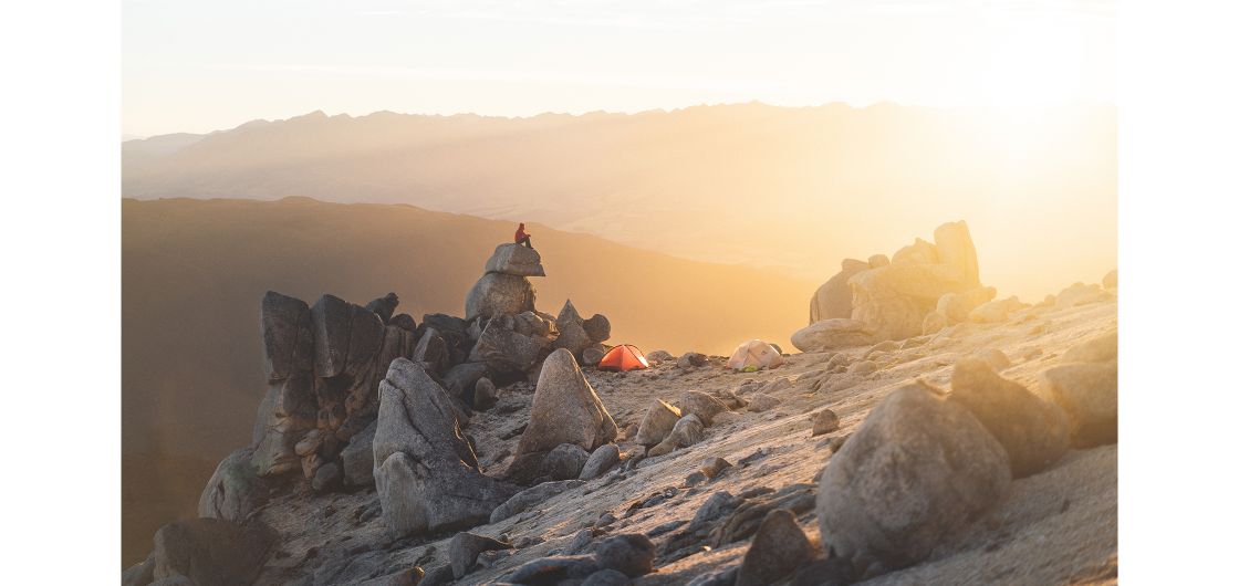 Late evening camping scene in the alpine