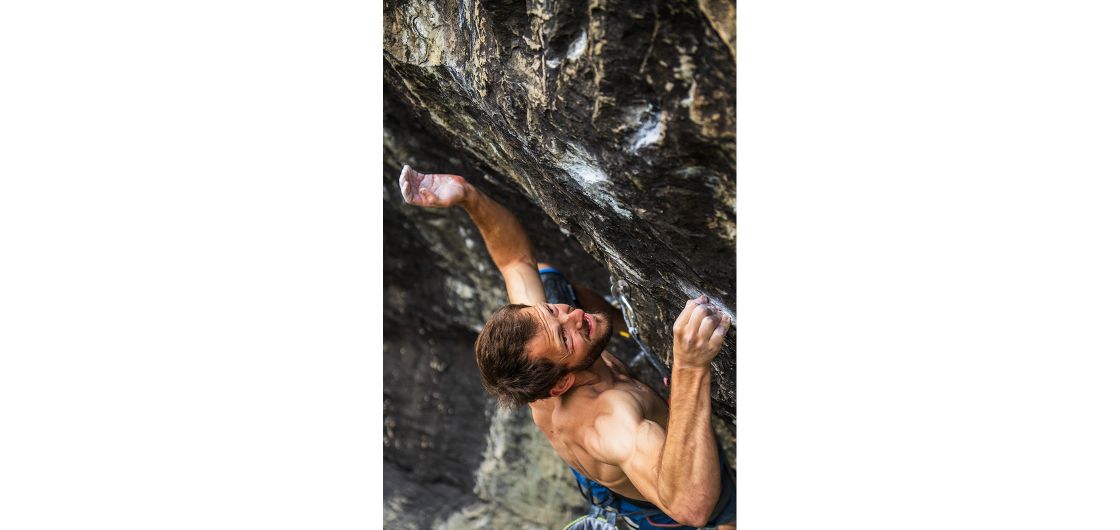 Climber holds tiny grips