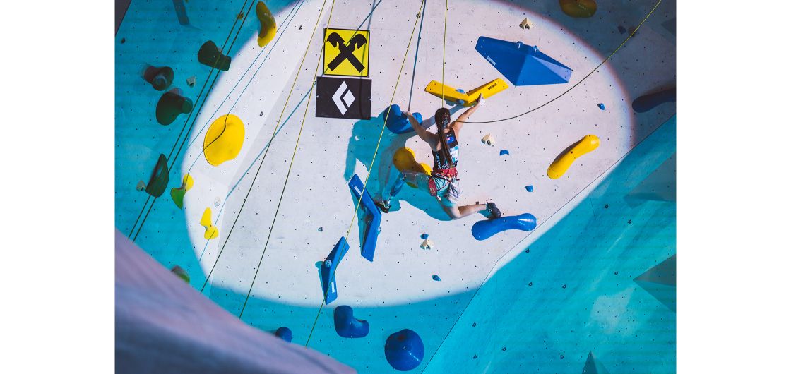 Rachel competing in 2022 (supplied). Paraclimber competes in climbing competition