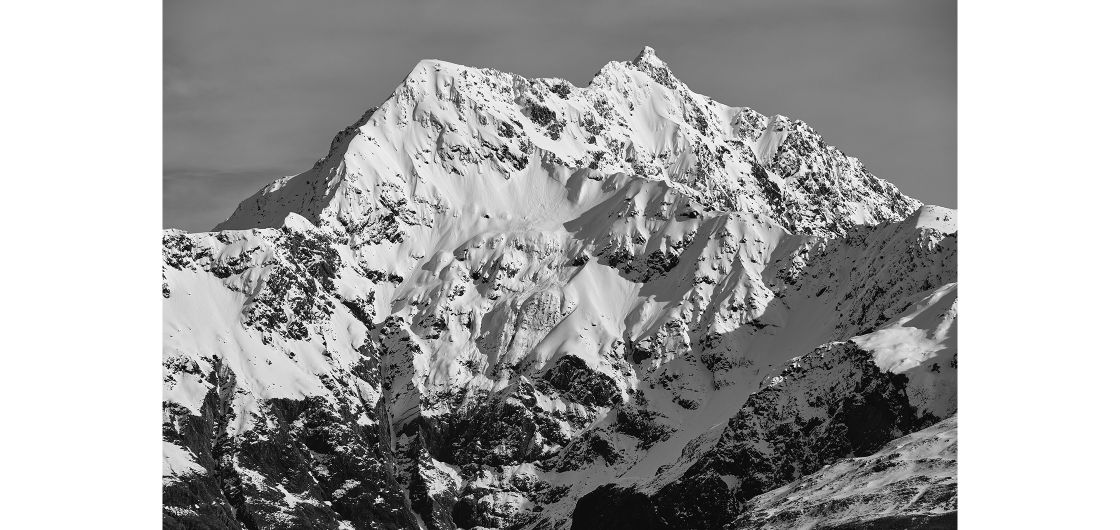 Black and white image of snowy mountain