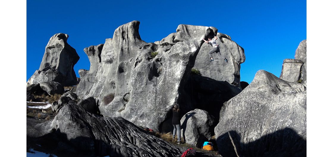 Climber on large boulder