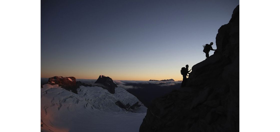 Aspiring at sunrise. Photo: MJ Grove. Silhouetted climbers