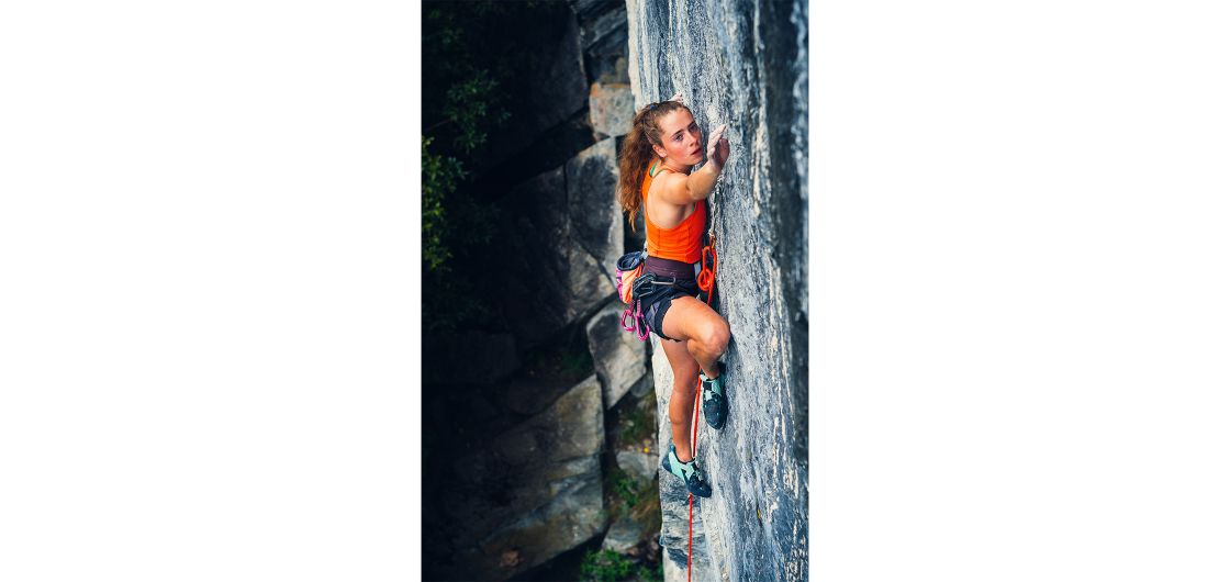 Fia Warburton focused on the gentlemen's club "White Pepper". Photo: Nat Warburton climber on rock face