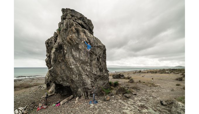 Rock climber on boulder