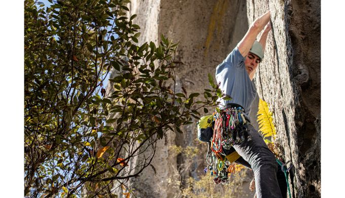 rock climber on ignimbrite