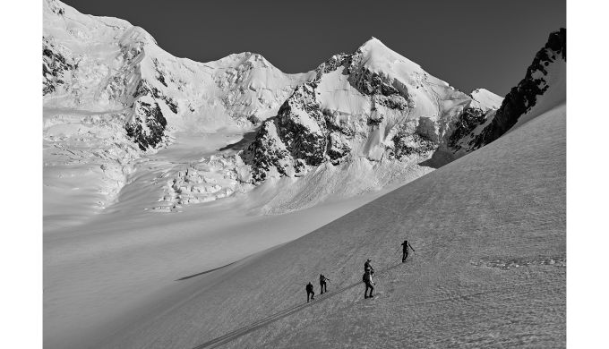 black and white image oif mountaineers near Aoraki