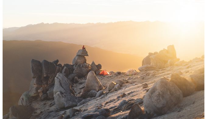 Late evening camping scene in the alpine