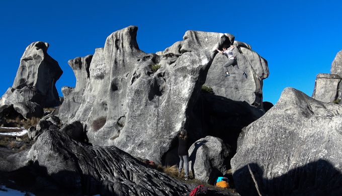 Climber on large boulder