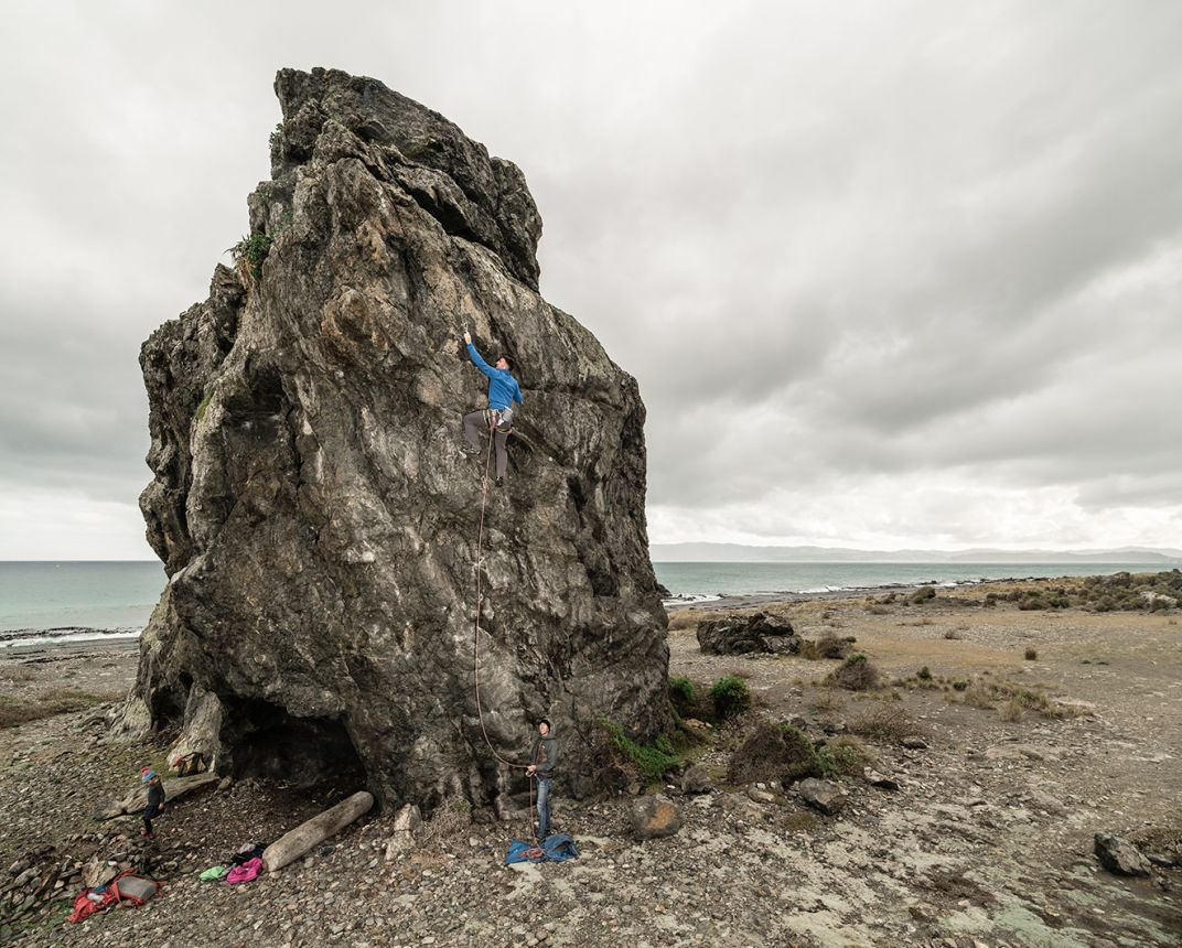 Rock climber on boulder