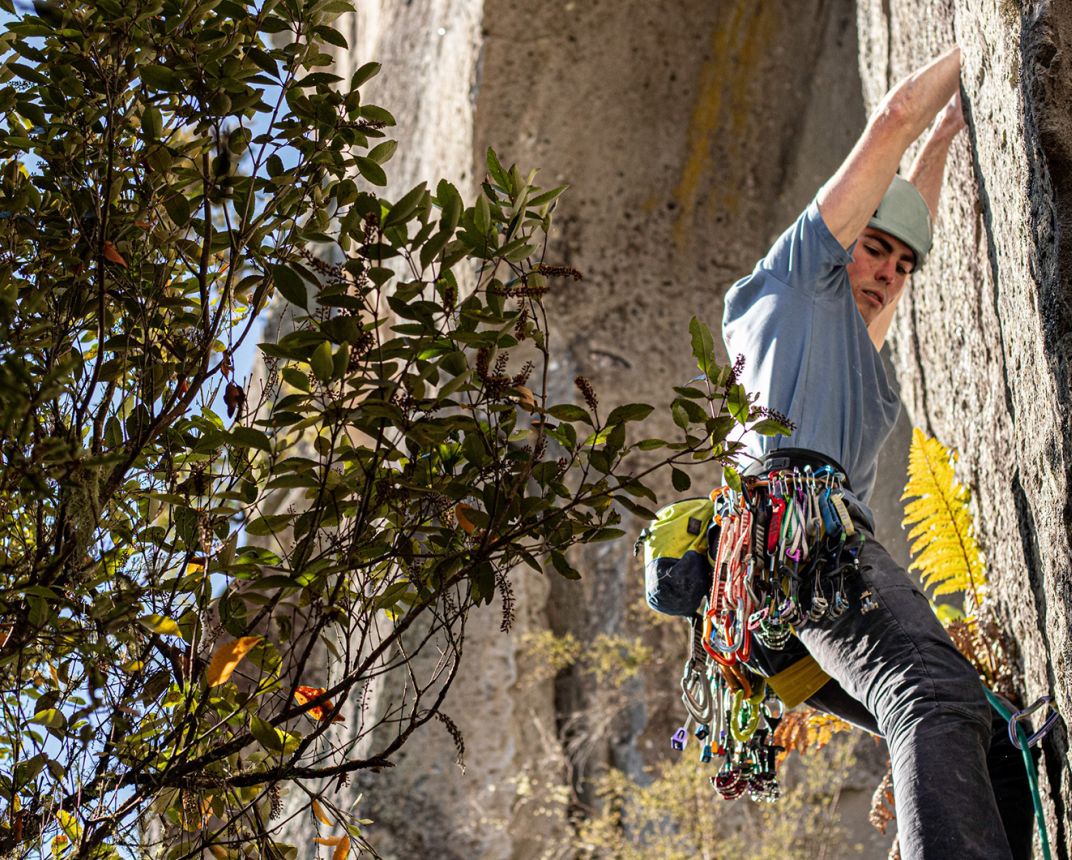 rock climber on ignimbrite