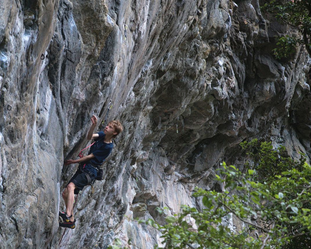 Climber on steep granite