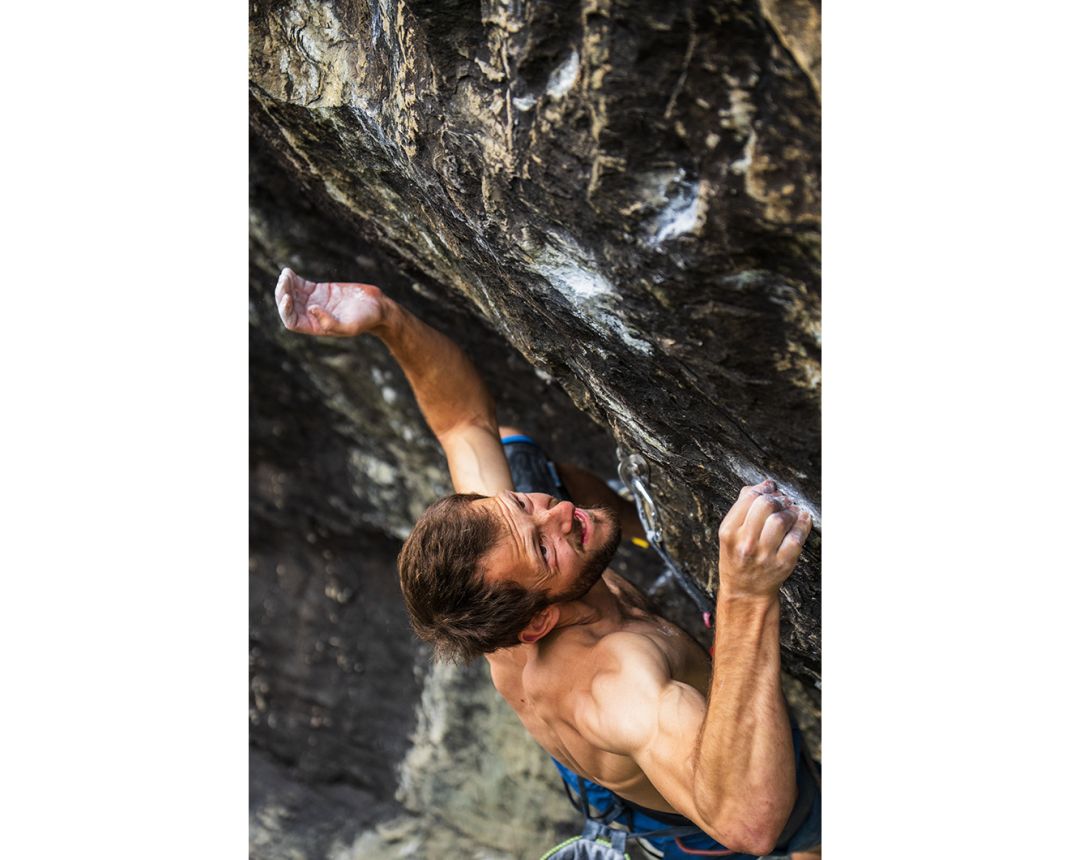 Climber holds tiny grips