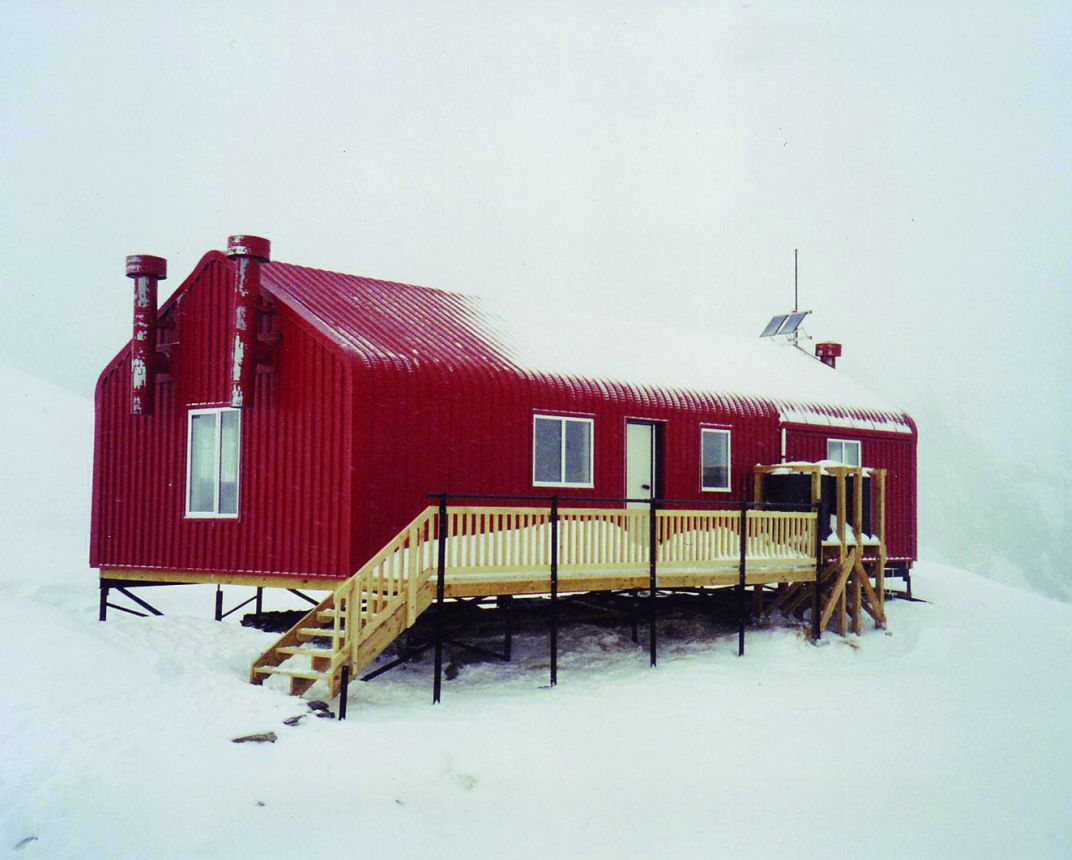 Hut in snowy white-out