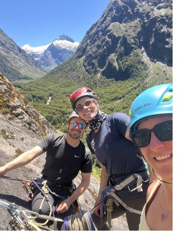 Rock climbers at hanging belay