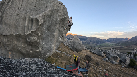 Climber on large boulder