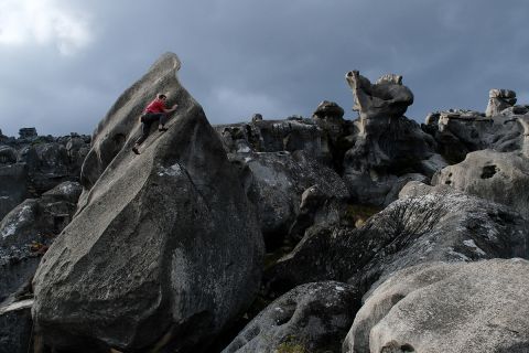 Climber on large boulder