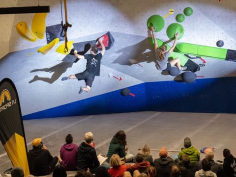 Competition climbers competing