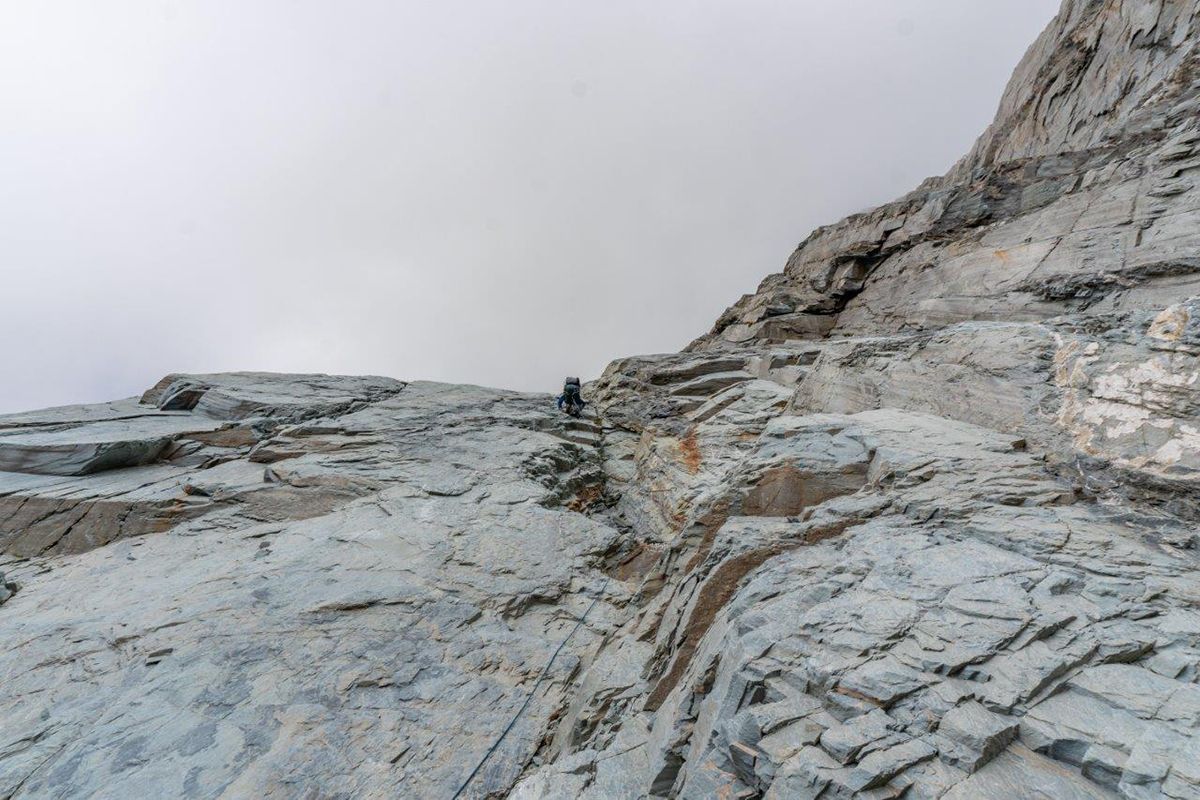 Climber on alpine rock