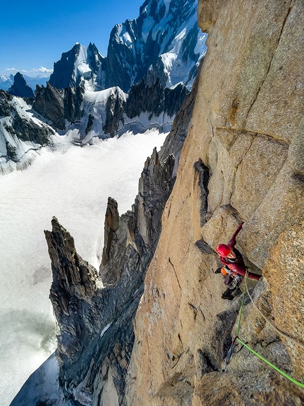 Climber above clouds