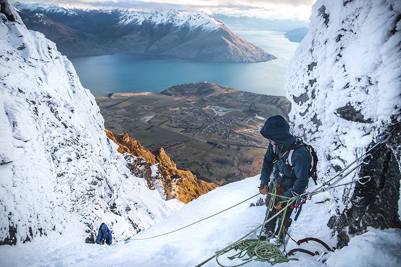 Ice climbers above lake