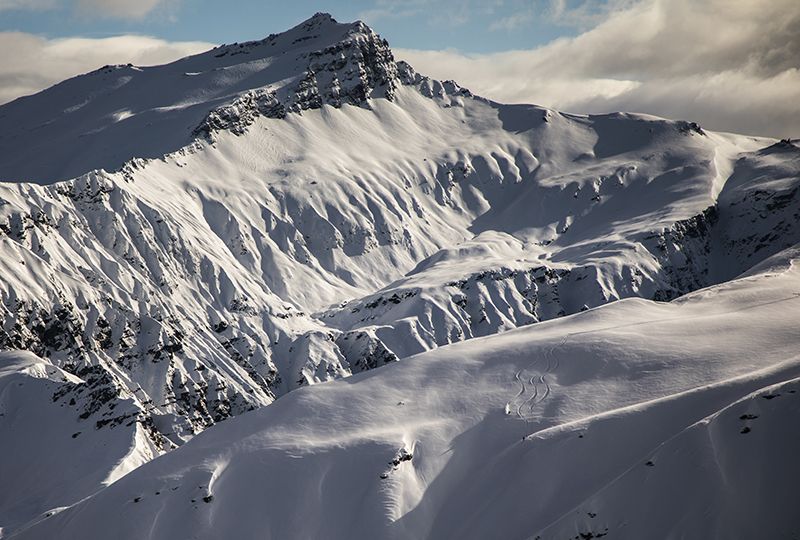 Skiers on big mountain