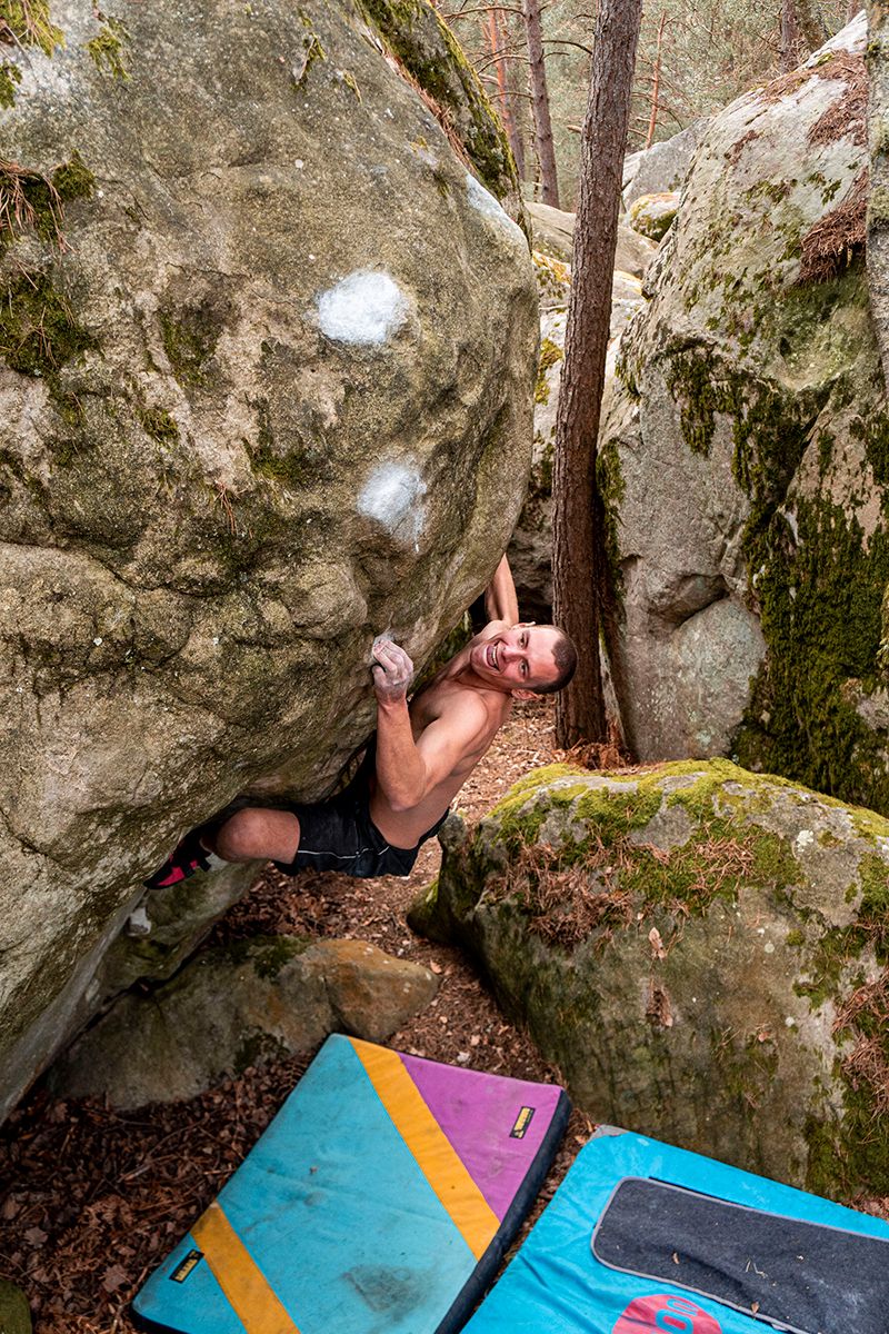 Climber eyes the next chalky hold