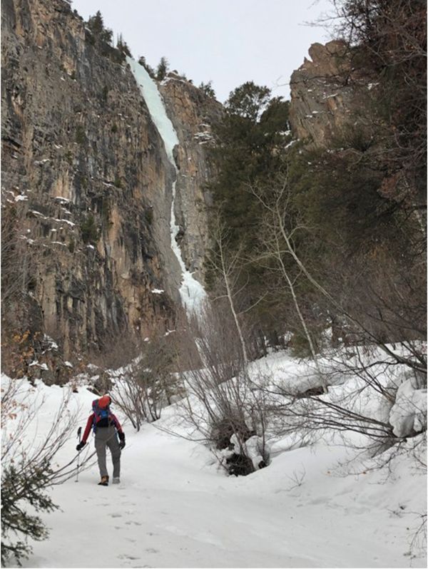 Ice climber with pack