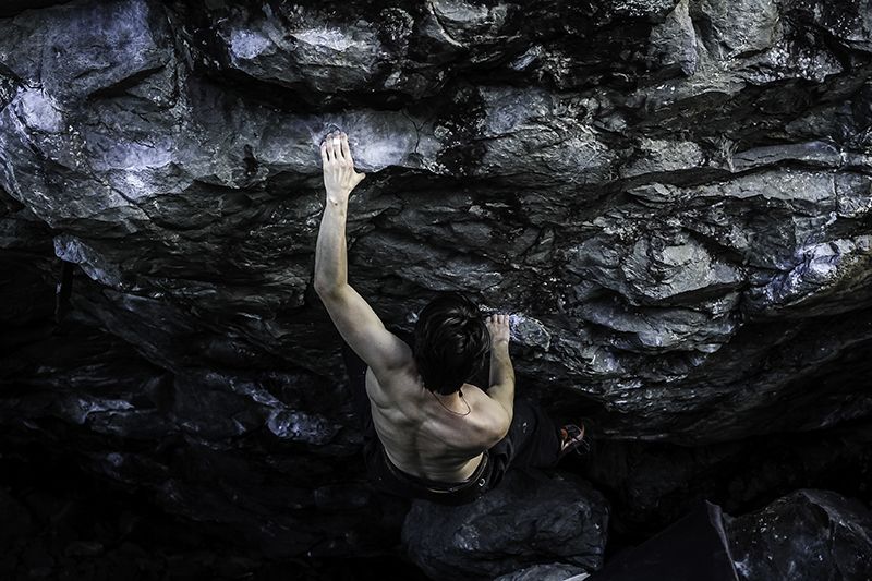 Boulderer on roof