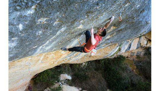 Climbed users one-finger pocket on steep rock climb. It looks very strenuous.