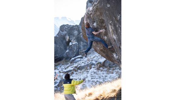 Climber on large boulder