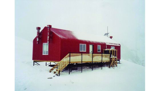 Hut in snowy white-out