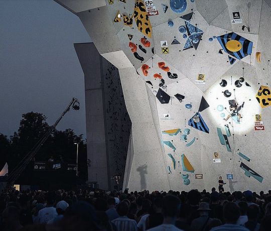 Competition climber on large lead wall