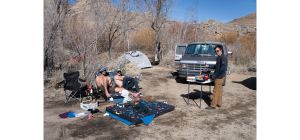 Climber's campsite with van and tents.
