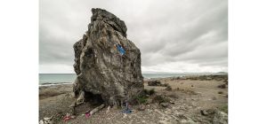 Rock climber on boulder