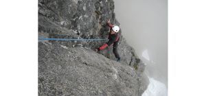 Climber on big rock route